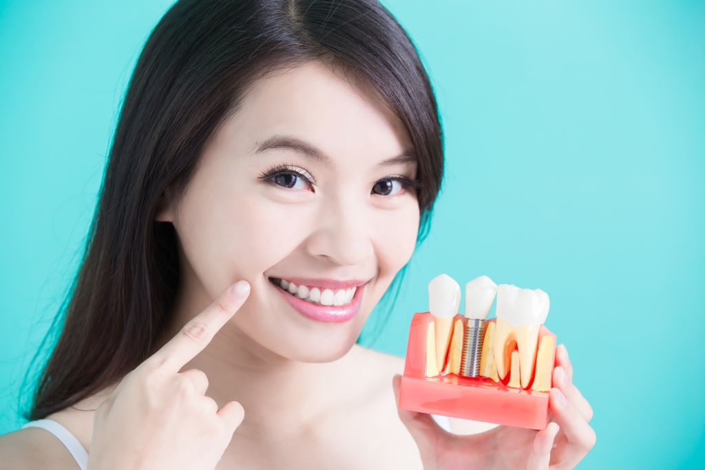 Dental implants match your existing teeth. 