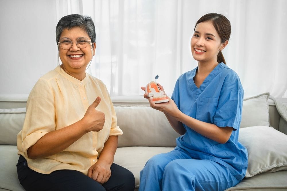 Dentist providing guidance on elderly oral care